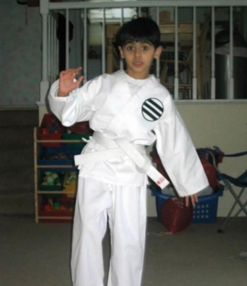 Rahul Dhiman as a child in a karate uniform